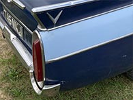 "V" fin emblem and elliptical taillights