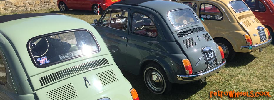 Original Fiat 500s at a classic car show